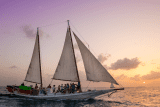 Danger Charters private boat charter sailing at sunset