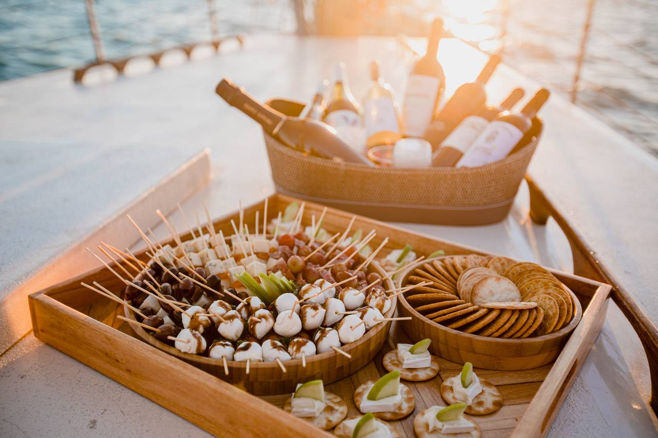 Selection of appetizers and beverages available to guests on a sailing charter in Key West, FL