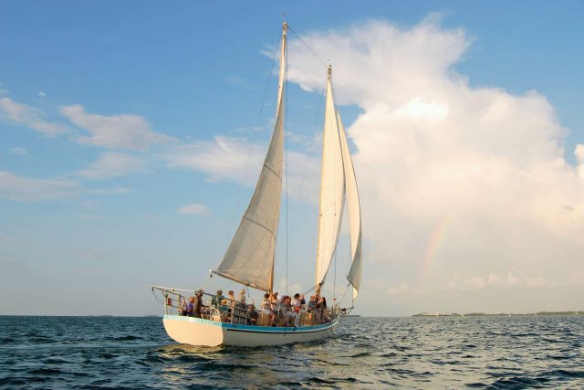 A group enjoys a day sail in a schooner near Key West