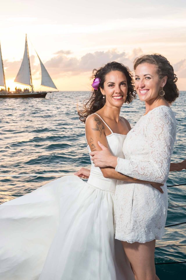 A female couple celebrates their wedding aboard a schooner in Key West, FL