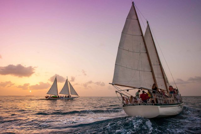 Two schooners sailing at sunset near Key West, FL