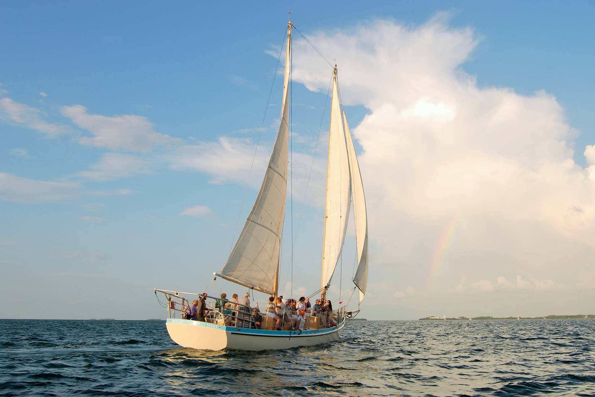 A group enjoys a day sail on a schooner in Key West with Danger Charters